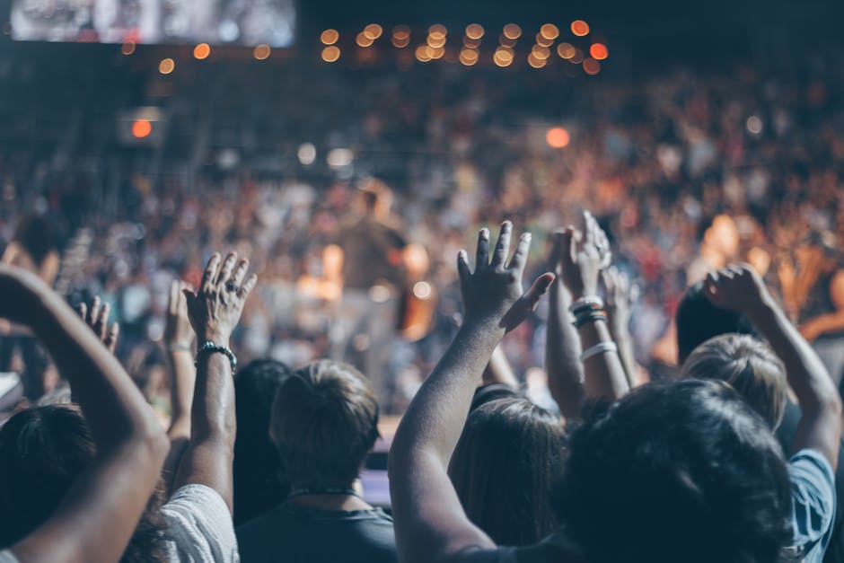 Large group enjoying a night out at a comedy show